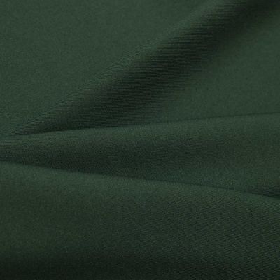 Ткань костюмная 21010 2076, 225 гр/м2, шир.150см, цвет т.зеленый - купить в Арзамасе. Цена 390.73 руб.